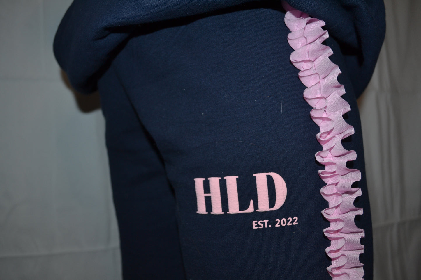 Navy and pink ruffle sweatpants